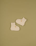 Botinhas tricot botão/ bege