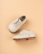 Sapatos feijão cordão/ pele cor cru